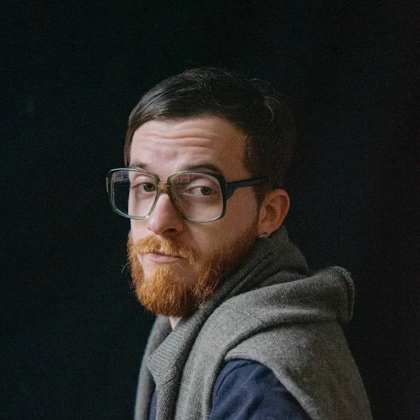 Денис Капустін